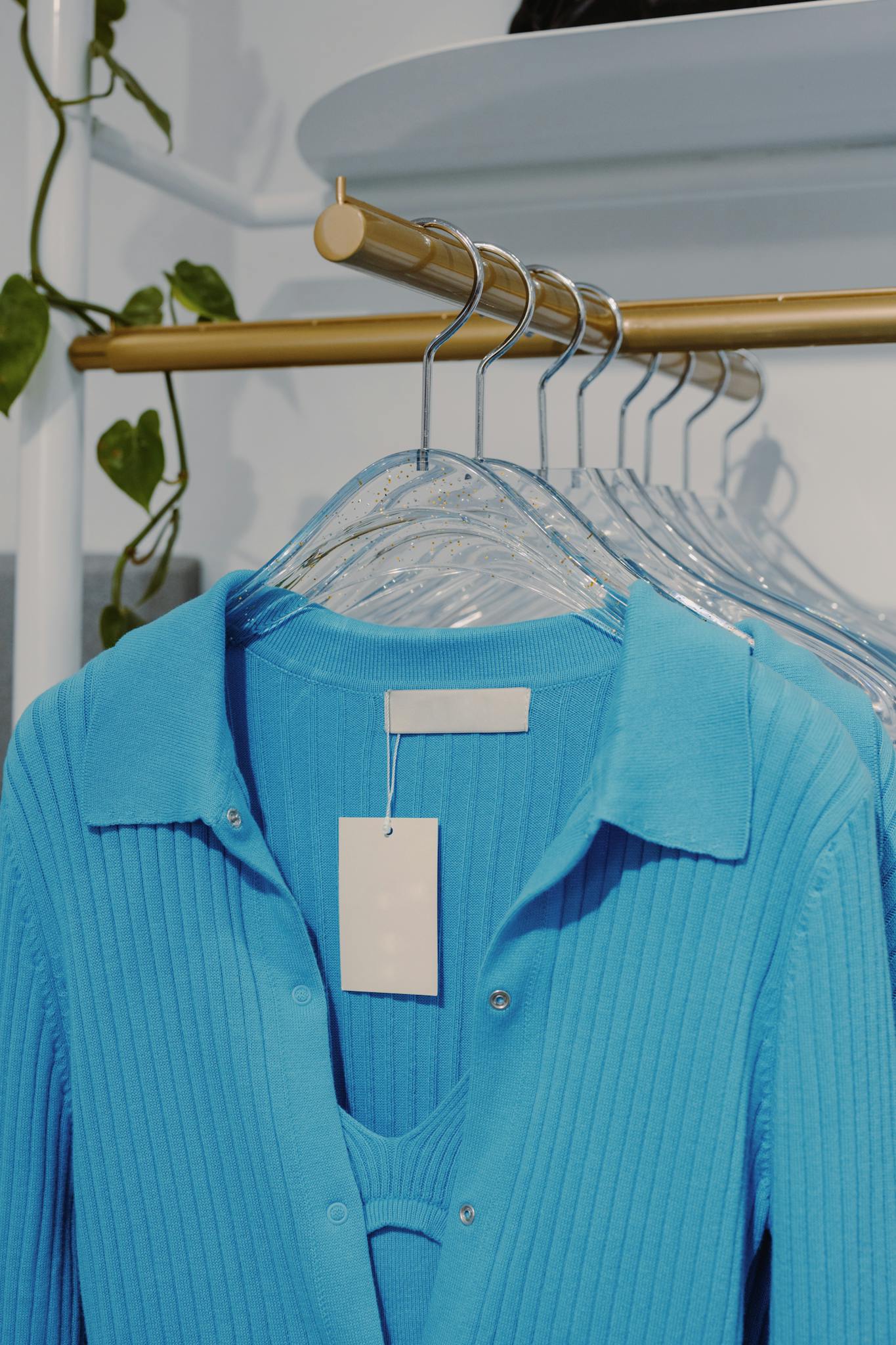Stylish Blue Ribbed Garments Hang Neatly On